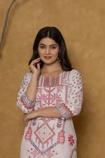 Side profile of model showcasing the comfortable fit and subtle elegance of the light purple pannel kurta with intricate patterns.