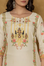 Close-up of the beautiful multi-color handwork embroidery and intricate patterns on the round neckline of the light yellow kurta, highlighting fine craftsmanship.