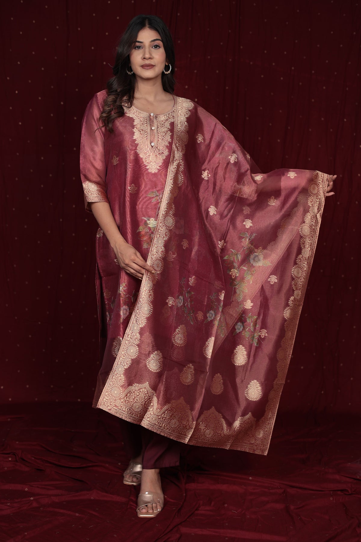 Close-up of the rich texture of the jacquard organza fabric on the kurti and dupatta, alongside the smooth feel of the soft silk pant, highlighting material quality.