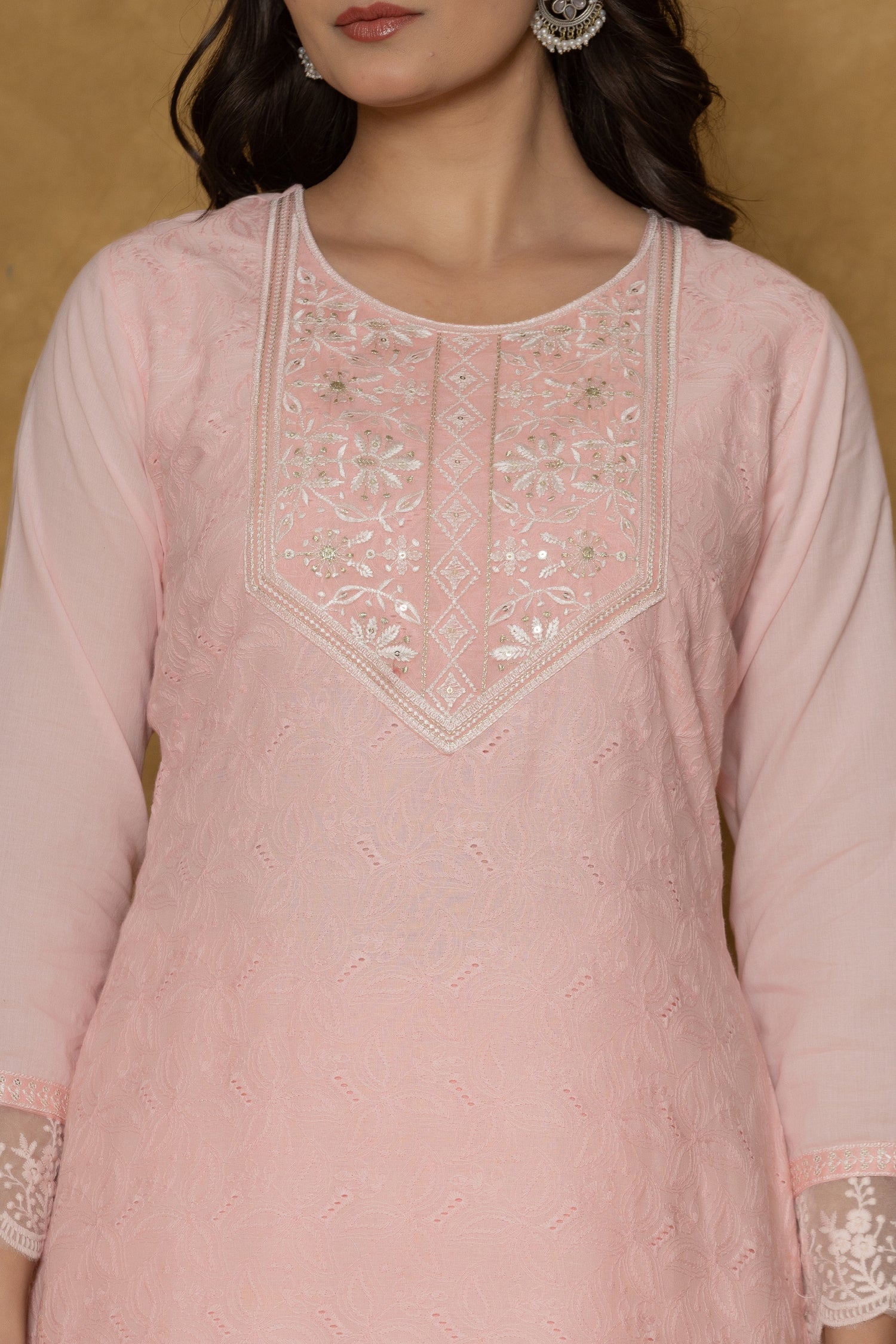Close-up of the delicate white embroidery on the round neckline of the pink cotton kurti, from the Chifley dupatta set.