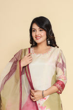 Side profile of model showcasing the graceful drape of the shimmer digital print dupatta and the fit of the pink and cream suit set.
