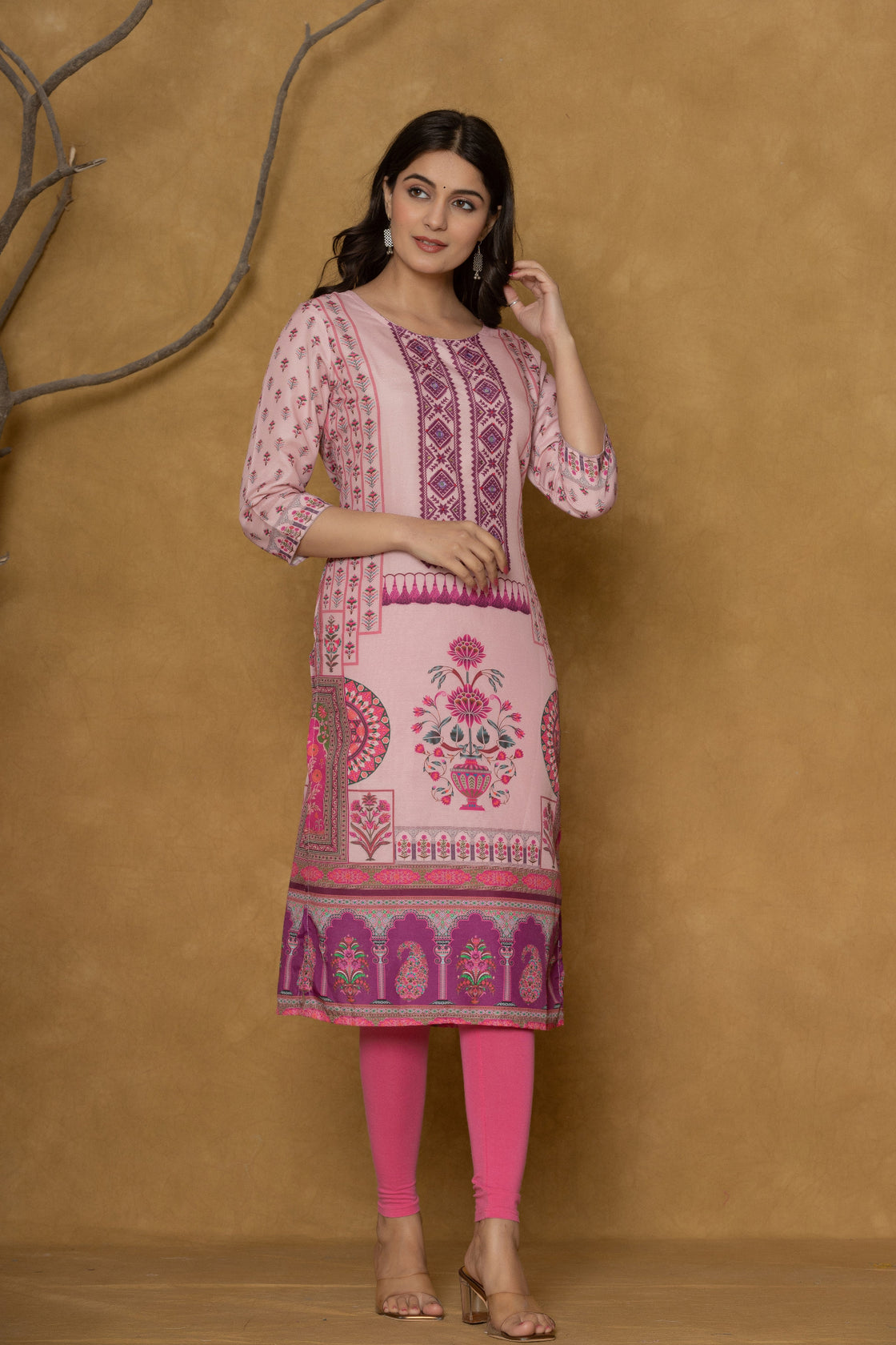 Model gracefully posing in the pink kurta with handwork, showcasing the comfortable movement and elegant style of the ethnic wear.