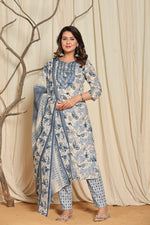 Model wearing a premium cotton floral printed kurta set from The Navra, featuring a beautiful blue and white block print design on the kurti, matching dupatta, and comfortable pants. Ideal for daily and casual ethnic wear.