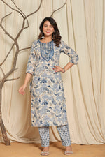 Flat lay arrangement of the complete premium cotton floral printed kurta set, highlighting the matching patterns on the kurti, dupatta, and pants.