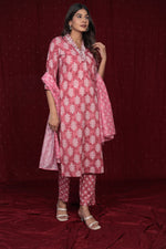 Flat lay arrangement of the complete pure cotton rust pink dupatta set, including the embroidered kurta, printed dupatta, and comfortable cotton pants.