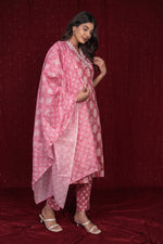 Close-up of the intricate print on the pure cotton rust pink kurta and the soft texture of the matching pant, highlighting fabric quality and design.