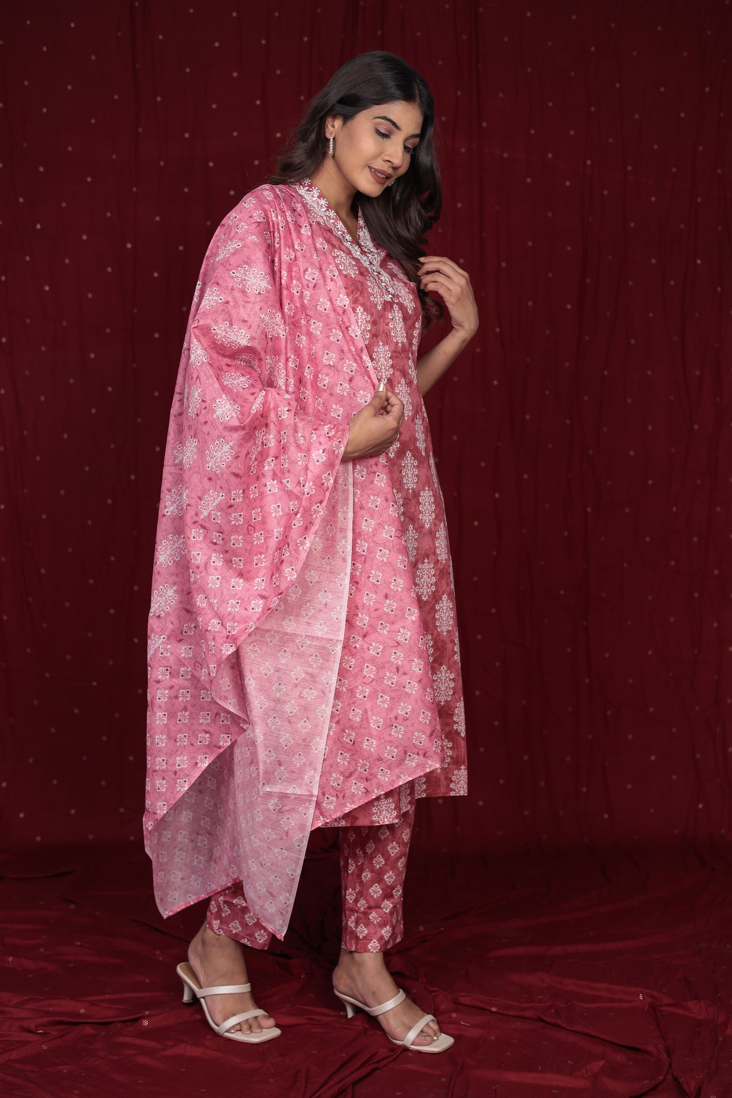 Close-up of the intricate print on the pure cotton rust pink kurta and the soft texture of the matching pant, highlighting fabric quality and design.