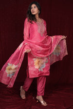 Close-up of the delicate shimmer organza fabric of the kurti and dupatta, and the soft texture of the muslin pant, highlighting material quality.
