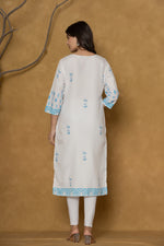 Back view of the white kurta, showing the clean design and the continuation of the blue print at the hem.