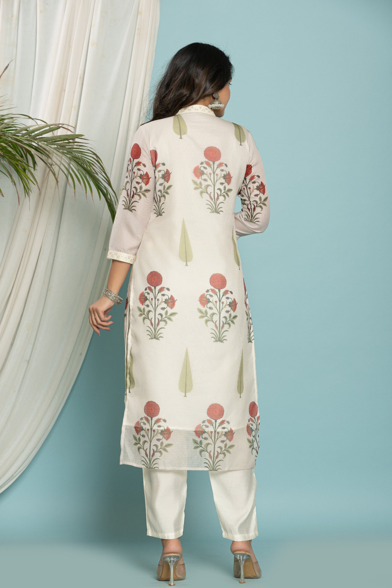 Alt Text: Back view of the white Kota Doria dupatta set, showing the clean drape of the kurti and the soft silk pant.
