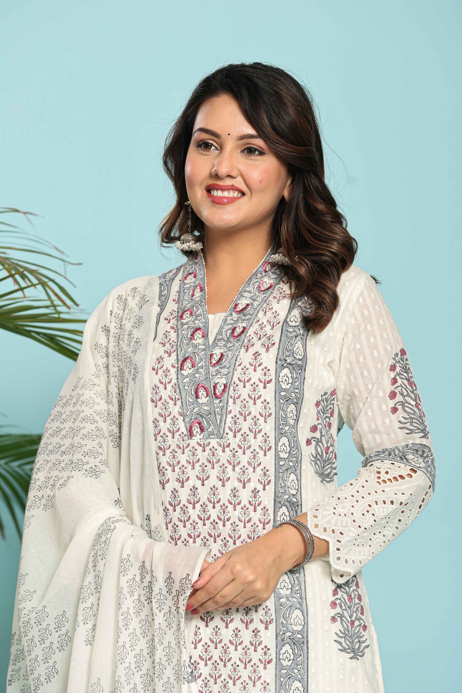 Side profile of model showcasing the comfortable fit and elegant drape of the white and grey original hand block dupatta set.