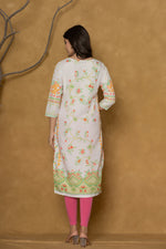 Back view of the white and lime pannel kurta, showing the clean design and the continuation of the vibrant patterns.