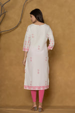 Back view of the white pannel kurta, showing the clean design and the continuation of the hemline pattern.
