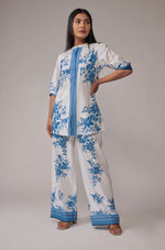Model in a confident pose, showcasing the full elegance and comfortable fit of the white and royal blue digital print co-ord set.