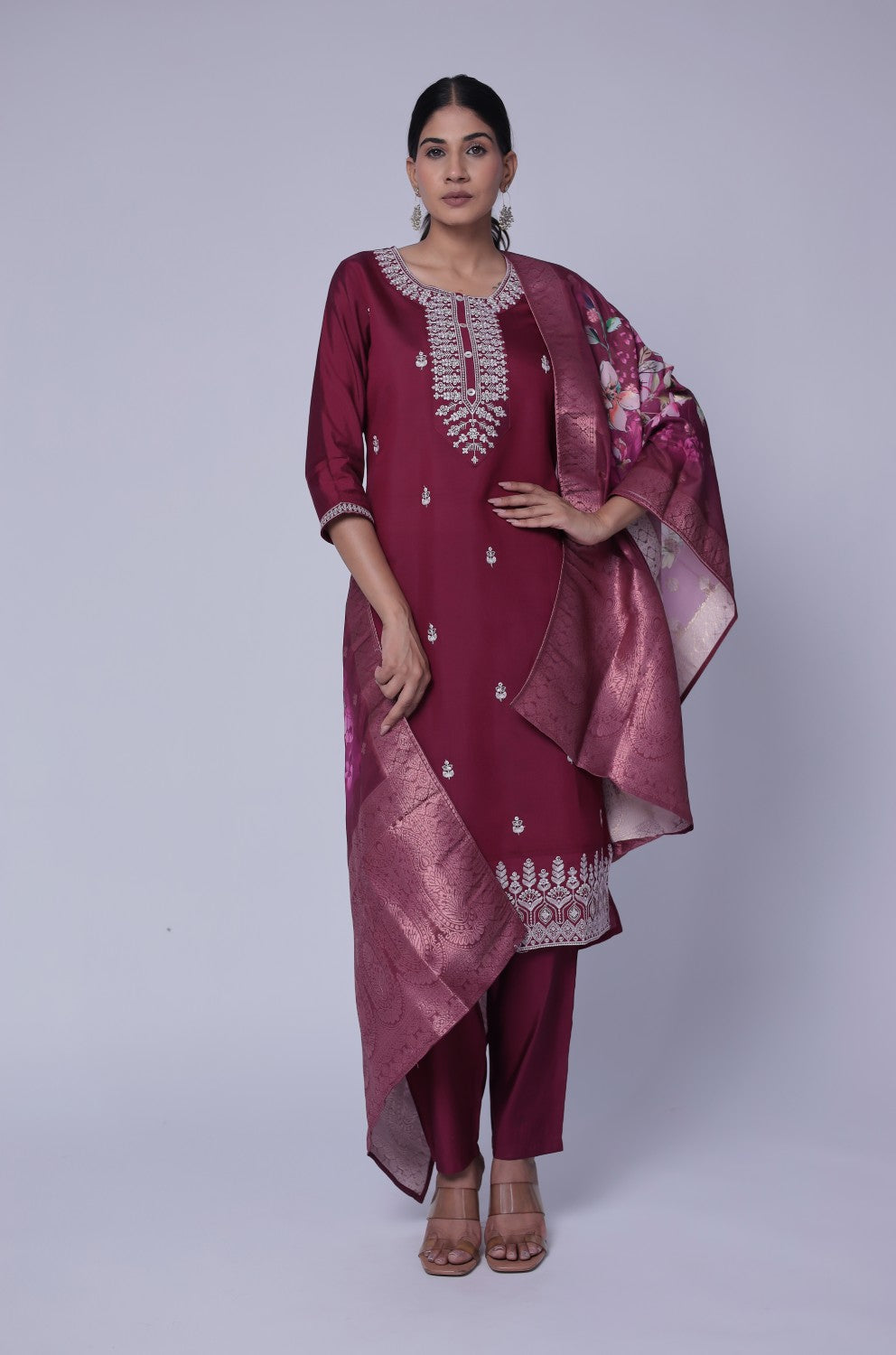 Flat lay arrangement of the complete wine soft silk suit set, featuring the embroidered kurta, printed jacquard dupatta with floral motifs, and matching pants, showcasing the full design.
